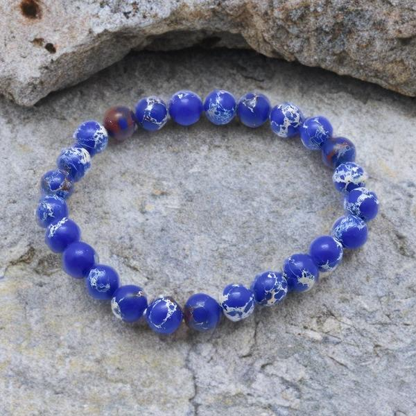 Bracelet Unisexe en Pierre Naturelle de Régalite Bleue, Perles 6 mm – Élégance Authentique et Intemporelle